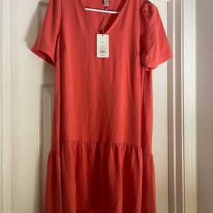 Cute Salmon color babydoll dress.